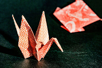 <h1>Origami<br /><span style='font-size: large; font-style: italic!important;'>Legend of a Thousand Cranes & Dragons</span></h1> Origami crane